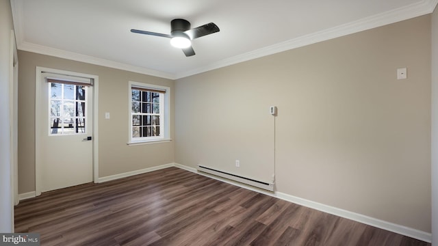 spare room featuring dark wood-type flooring, ceiling fan, ornamental molding, and a baseboard heating unit