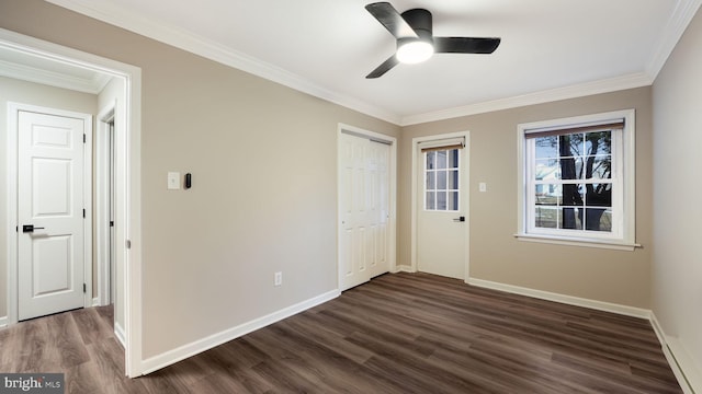 interior space featuring crown molding, dark wood-type flooring, and ceiling fan