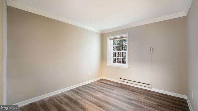 unfurnished room with baseboard heating, crown molding, and hardwood / wood-style flooring