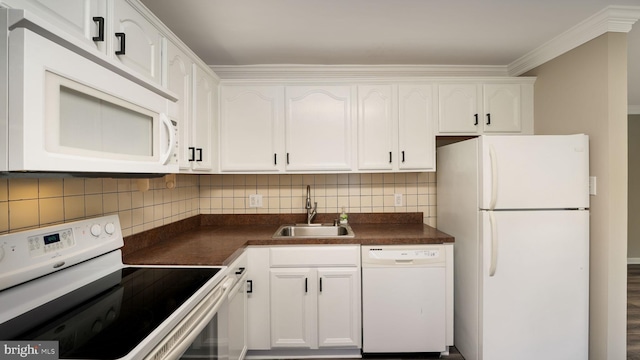 kitchen with white cabinetry, sink, white appliances, and backsplash