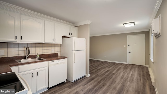 kitchen with crown molding, sink, white cabinets, and white appliances