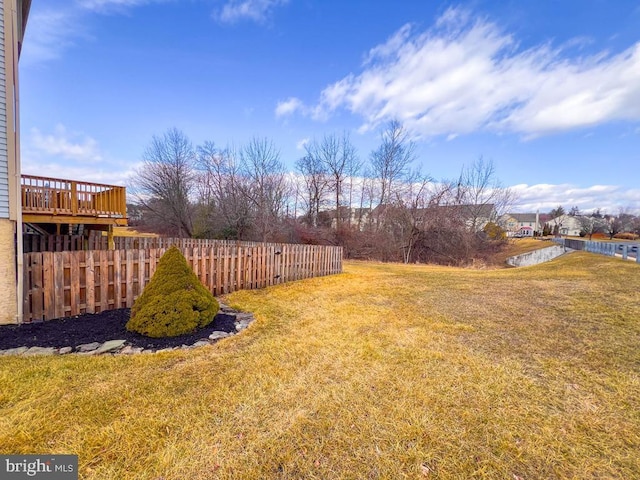 view of yard with a deck