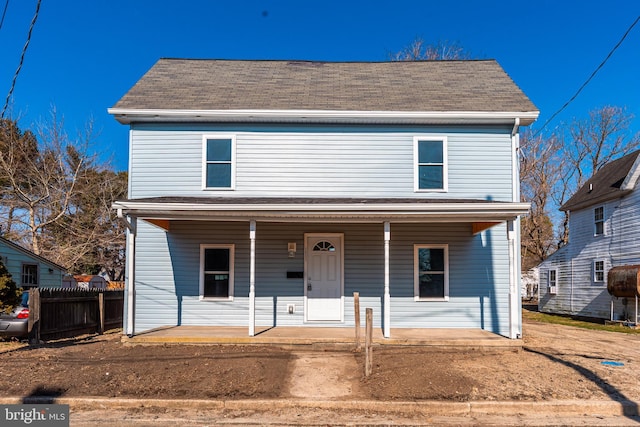 view of property with covered porch