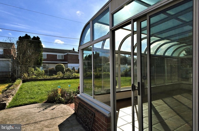 exterior space with a sunroom