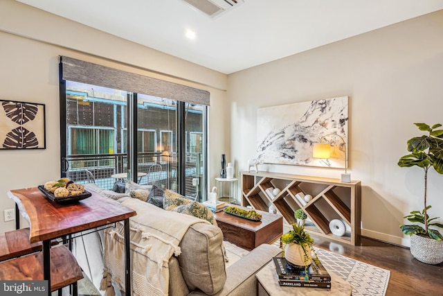 sitting room featuring hardwood / wood-style floors