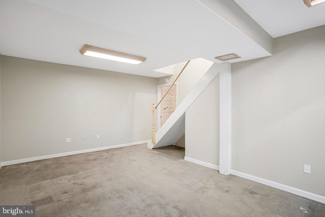 basement with carpet flooring