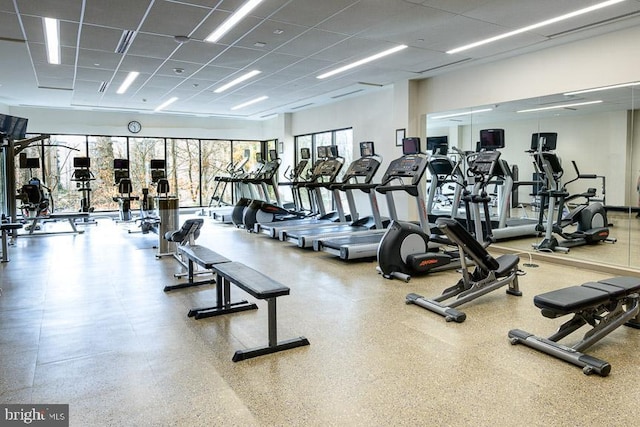 workout area featuring a drop ceiling