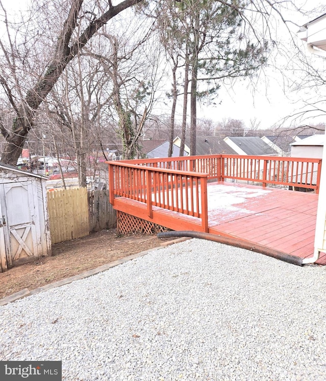 deck featuring a storage unit