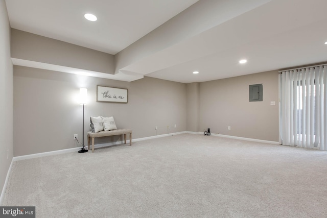 unfurnished room featuring electric panel, baseboards, carpet, and recessed lighting