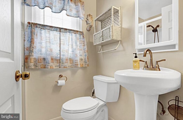 7 E 19th St, Long Beach Township, NJ 08008 - bathroom featuring baseboards and toilet