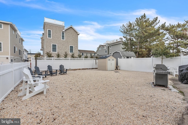 view of yard with a storage shed