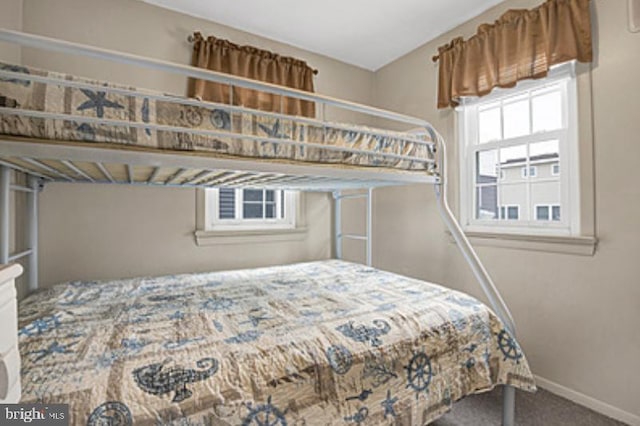 7 E 19th St, Long Beach Township, NJ 08008 - carpeted bedroom featuring baseboards