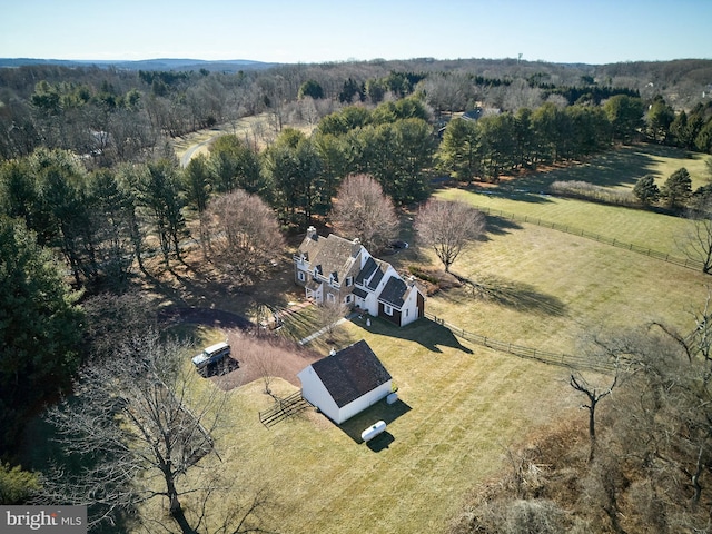 birds eye view of property featuring a rural view