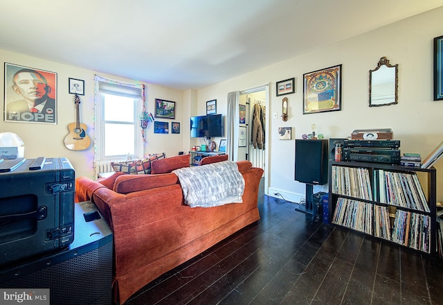 living room with dark wood-type flooring