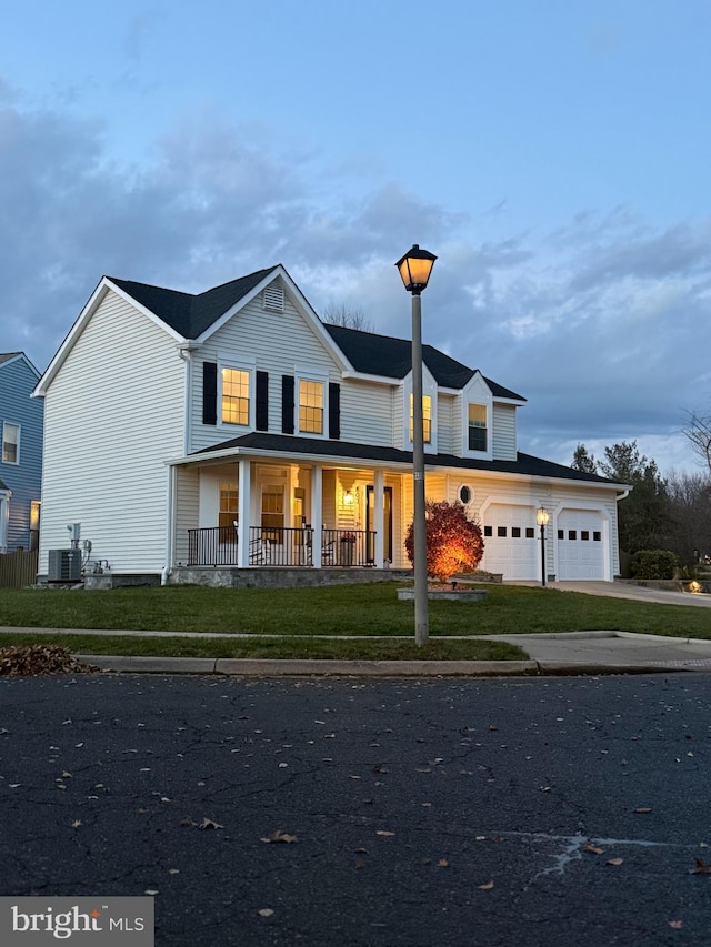 view of front of property featuring central AC and covered porch