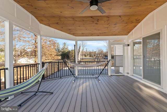 wooden deck with ceiling fan