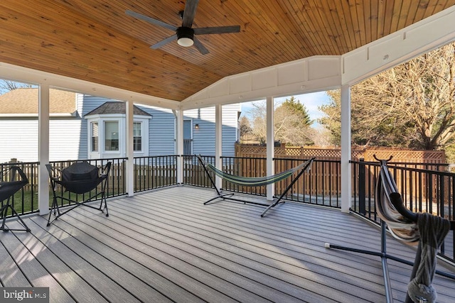 sunroom featuring wooden ceiling, vaulted ceiling, and plenty of natural light