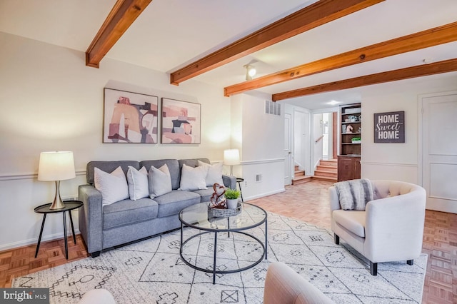 living room featuring light parquet flooring and beam ceiling