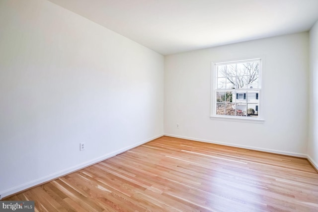 unfurnished room featuring light wood-type flooring