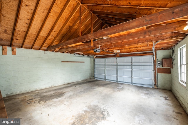 garage featuring a garage door opener