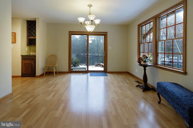 7 Heron Ct, Medford, NJ 08055 - interior space with light hardwood / wood-style flooring and a chandelier