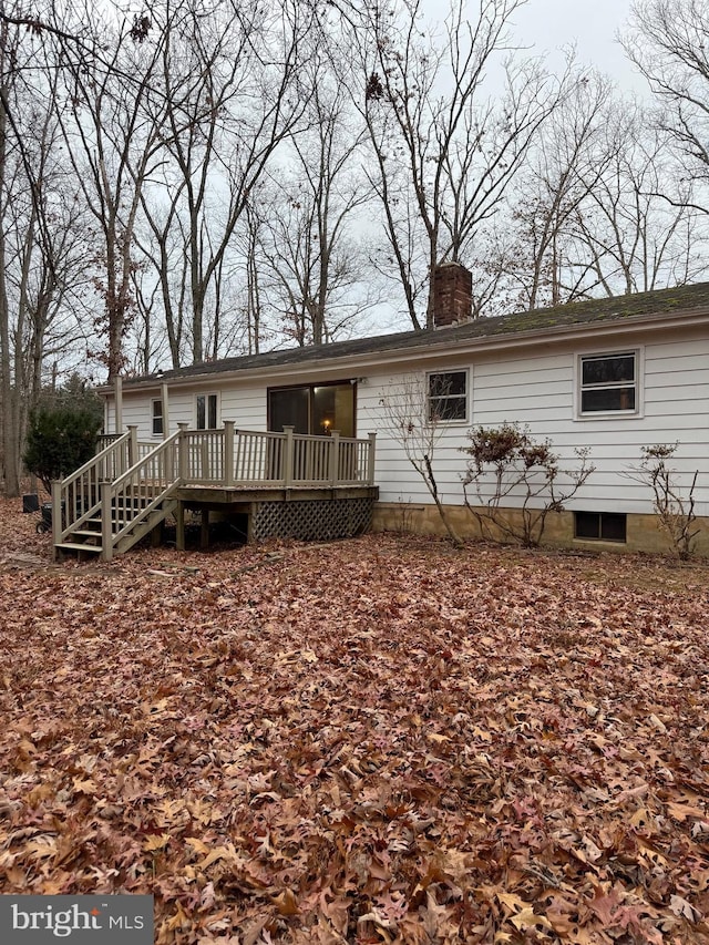 rear view of house with a deck