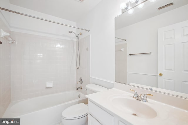 full bathroom featuring toilet, shower / bath combination, visible vents, and vanity