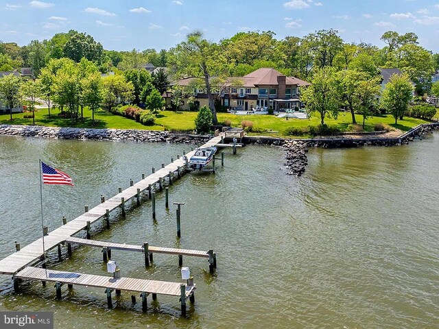 dock area featuring a water view