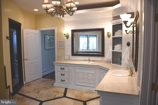 bathroom featuring vanity, a chandelier, and baseboard heating