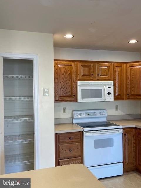 kitchen featuring white appliances