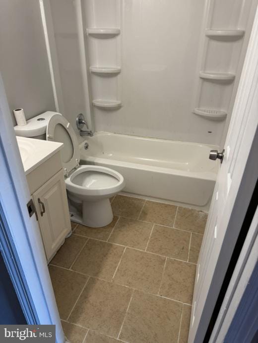 full bathroom with shower / bath combination, vanity, and toilet