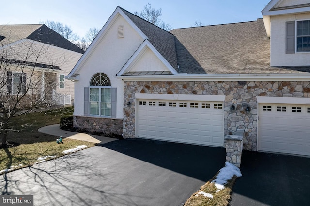 view of front of home featuring a garage