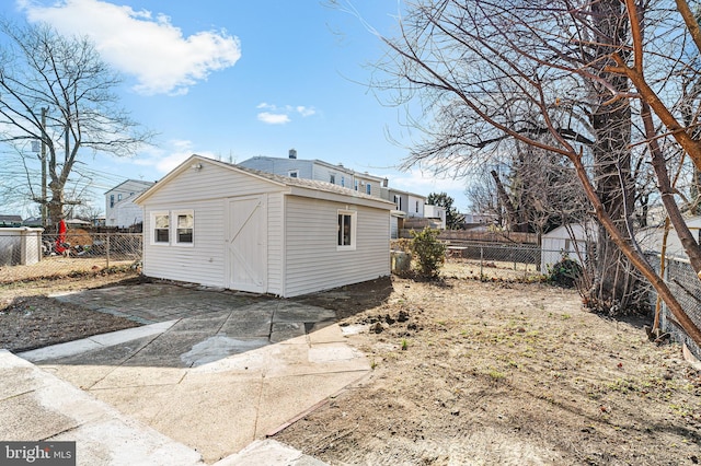 view of property exterior featuring a shed