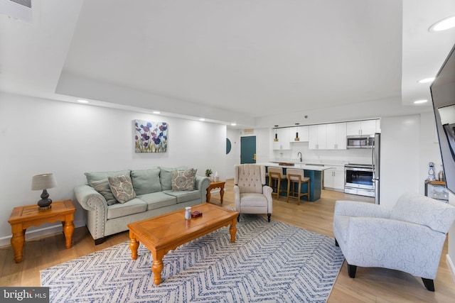 living room with light wood-type flooring