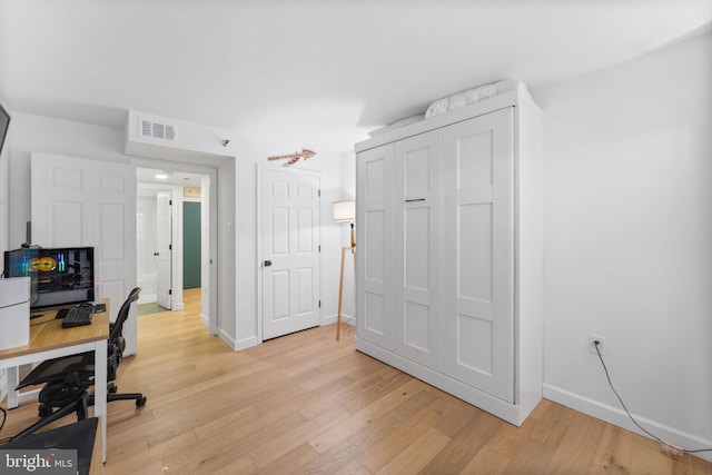 office featuring light hardwood / wood-style floors