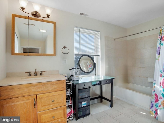 bathroom featuring tile patterned floors, vanity, and shower / bathtub combination with curtain