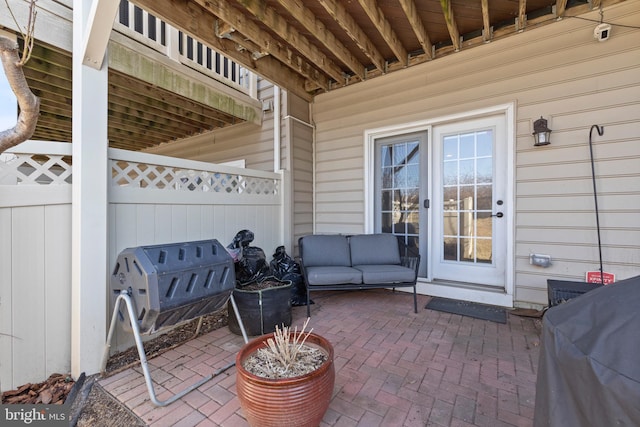 view of patio / terrace with fence and grilling area