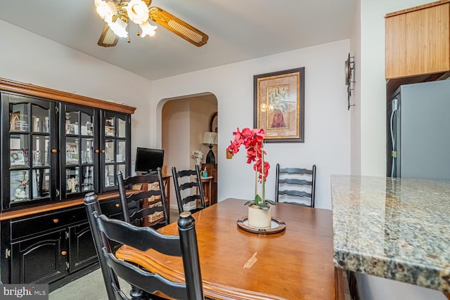 dining space with ceiling fan