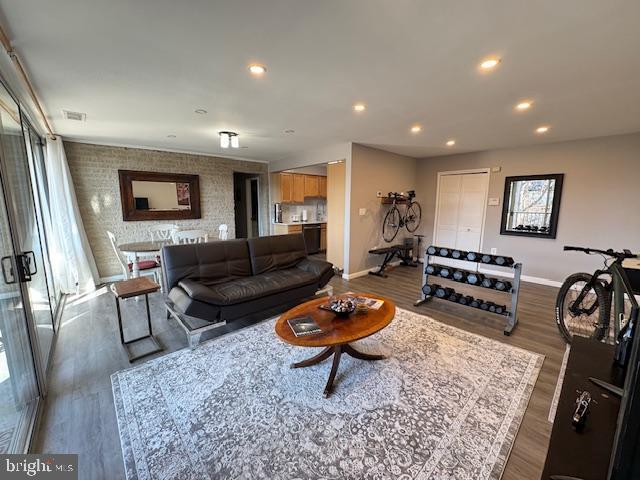 living room featuring dark wood-type flooring