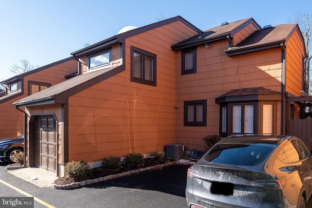 view of home's exterior featuring central AC unit