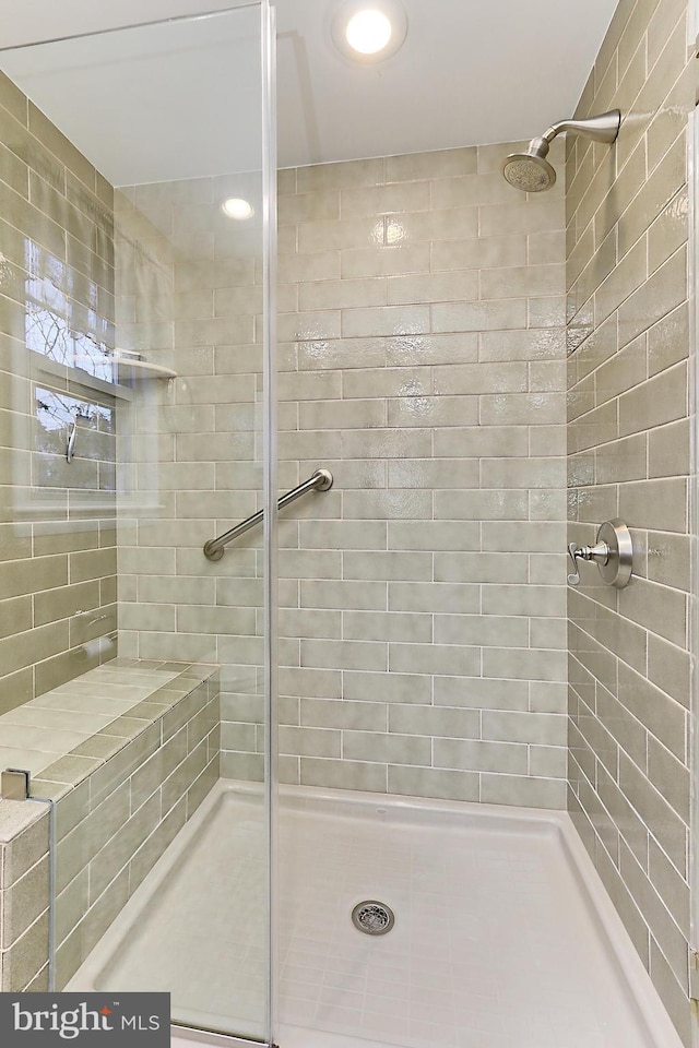 bathroom with a stall shower