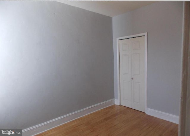 empty room featuring hardwood / wood-style floors