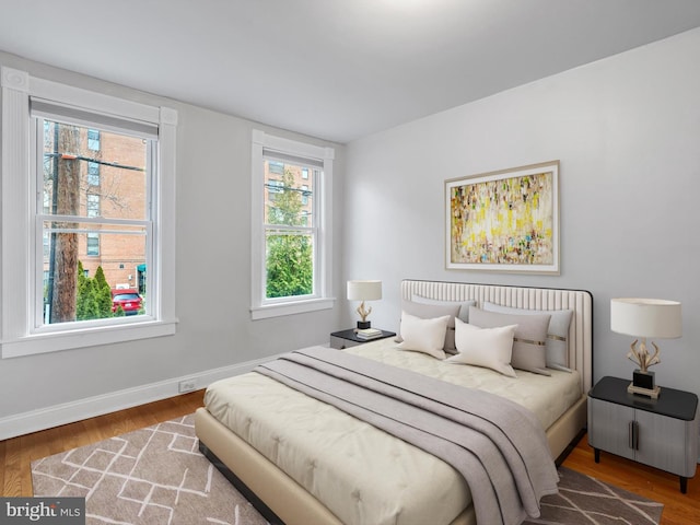 bedroom featuring hardwood / wood-style floors