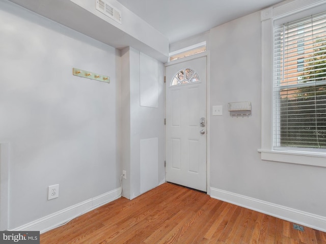 foyer entrance featuring light hardwood / wood-style floors