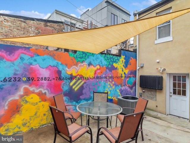 view of patio / terrace featuring cooling unit