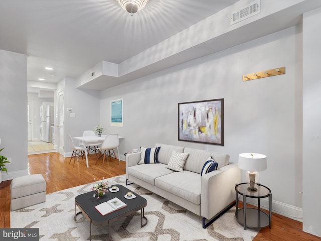 living room featuring light hardwood / wood-style flooring