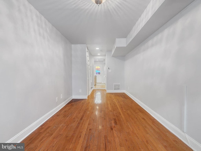 interior space with hardwood / wood-style floors