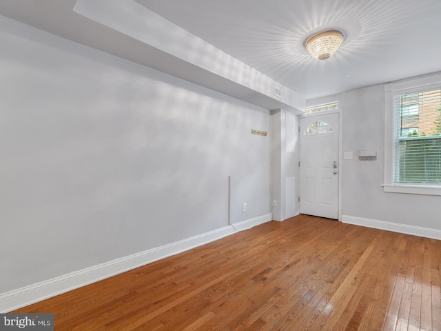 foyer with hardwood / wood-style flooring