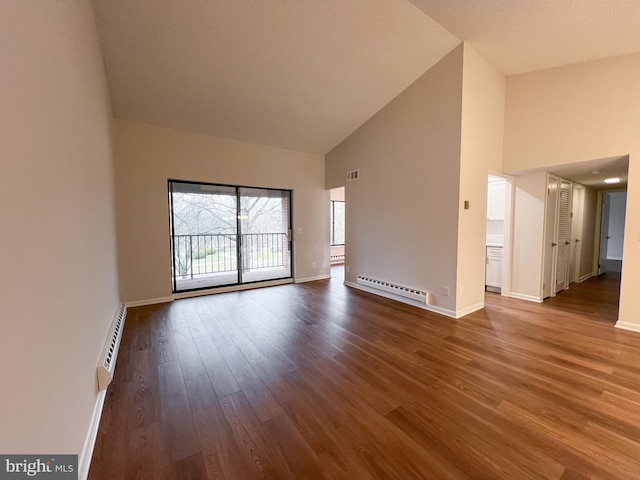 unfurnished room with a baseboard radiator, high vaulted ceiling, and hardwood / wood-style floors