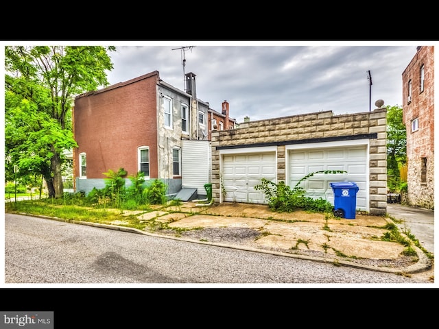 exterior space featuring a garage